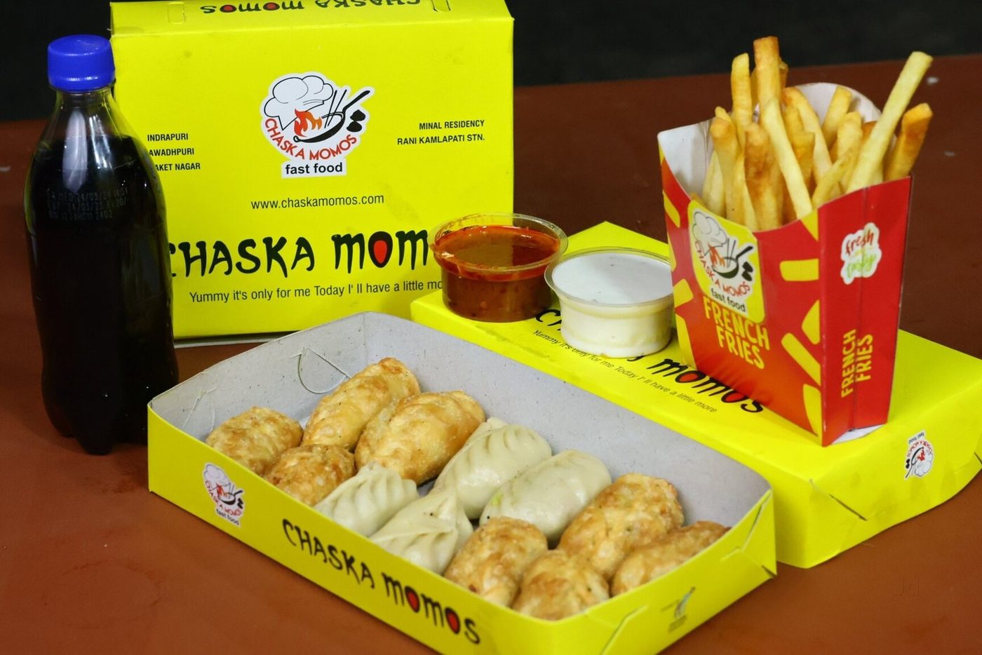 Momo combo with fries, cold drink and dips
