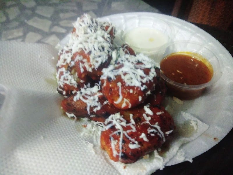 Peri peri cheese momos on a plate